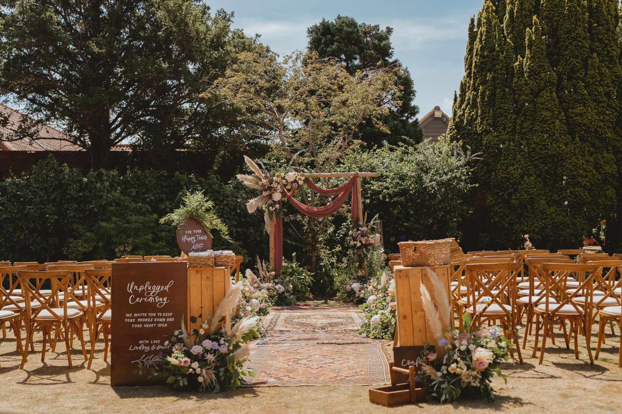 Walled Garden outdoor wedding ceremony set-up 